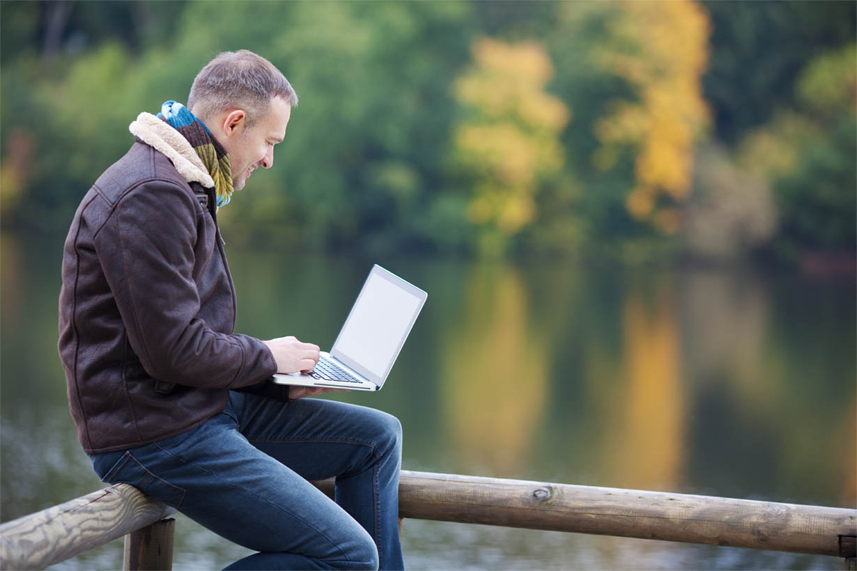 Business Man Working Outdoors in Natural Surroundings